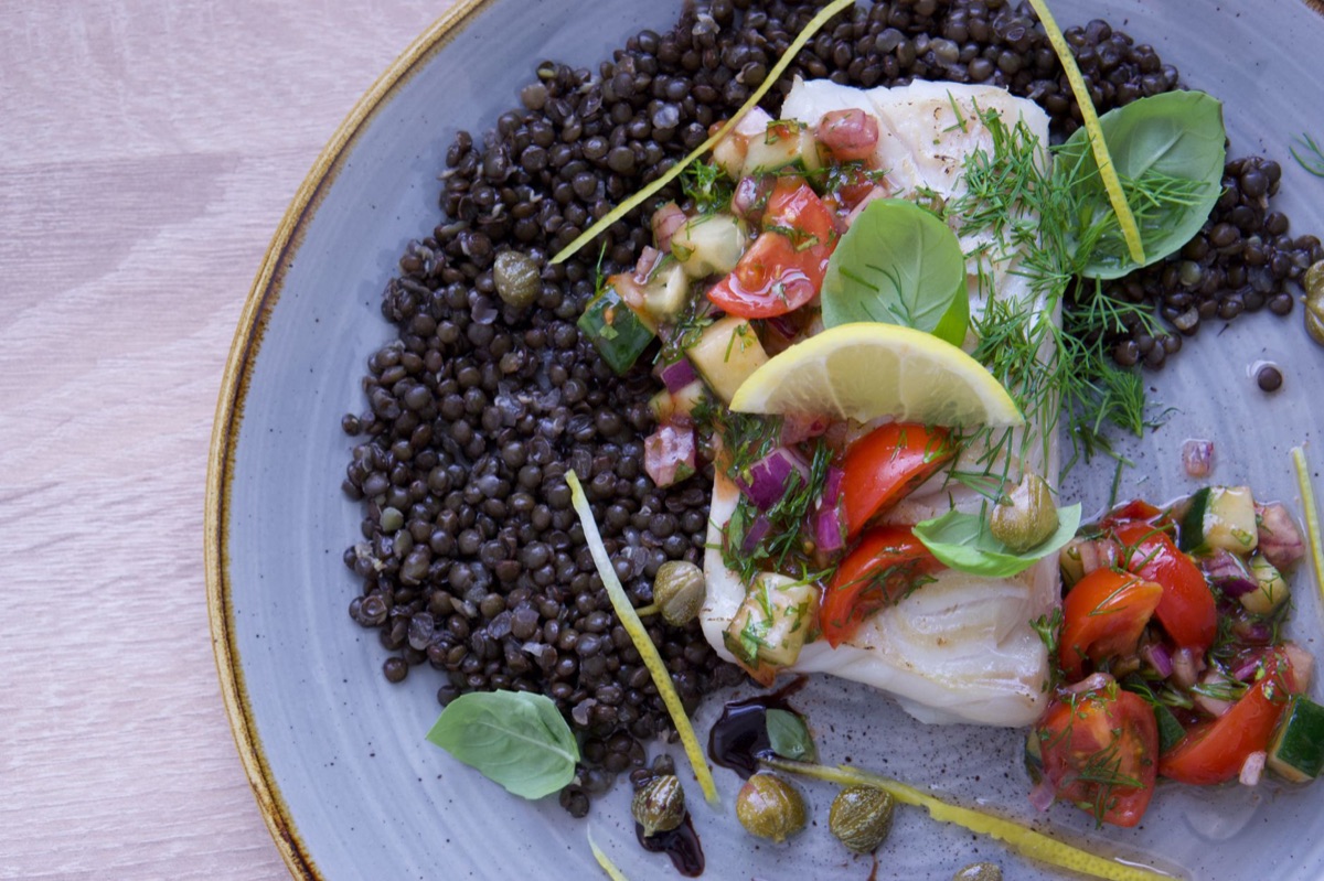 Lentil and vegetable plate with fresh herbs