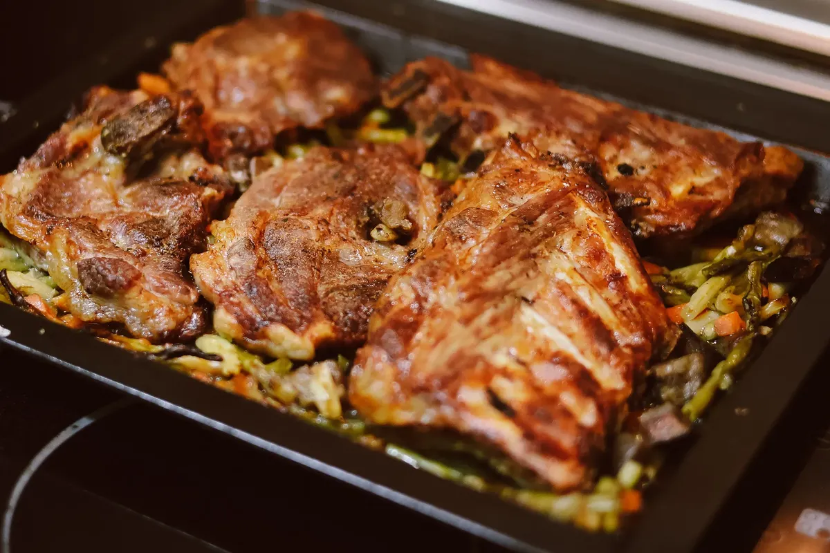 Juicy roasted meat paired with fresh vegetables for a perfect dinner.
